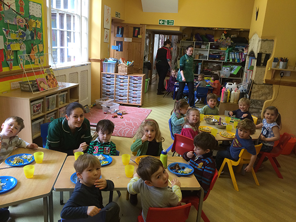 The pre-school enjoying their lunch Acorns Nursery School in Cirencester.