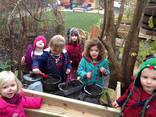 The mud kitchen in the garden at Acorns Nursery School Cirencester