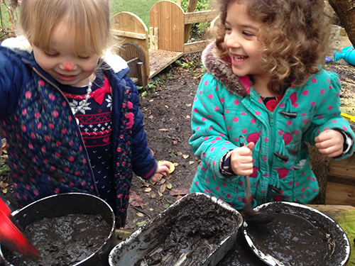 The mud kitchen in the garden at Acorns Nursery School Cirencester