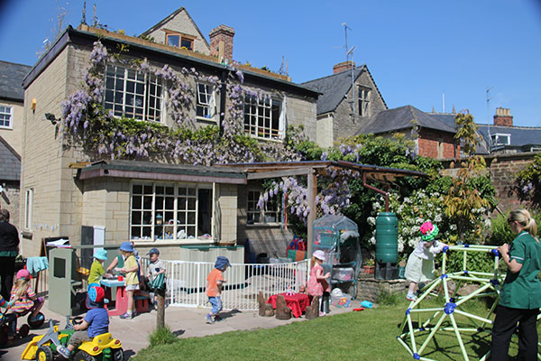 The main garden at Acorns Nursery School Cirencester