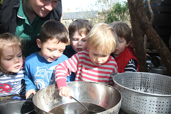 The mud kitchen garden at Acorns Nursery School Cirencester