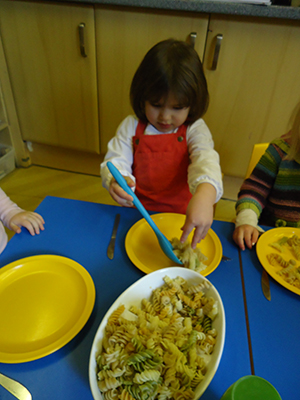 Serving up the pasta at Acorns Nursery School, Cirencester.