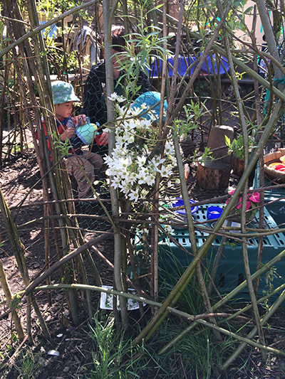 The mud kitchen garden at Acorns Nursery School Cirencester