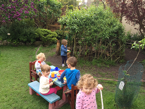 The mud kitchen garden at Acorns Nursery School Cirencester